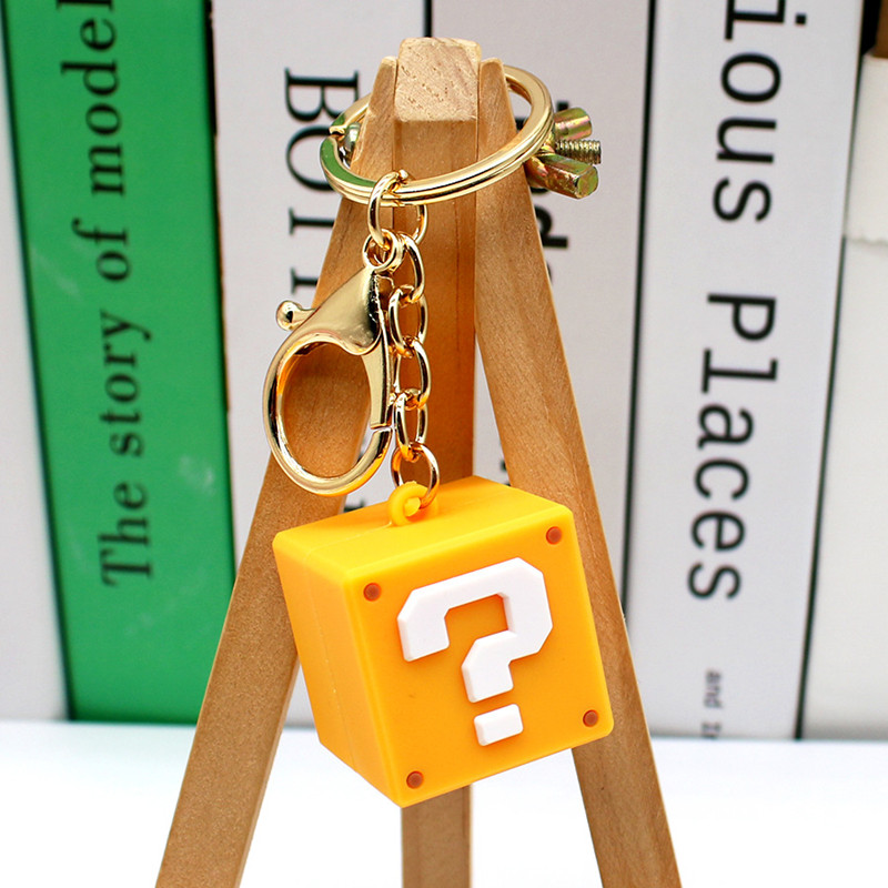 Creative Simulation Question M - огляд і ціна Gaming Console Keychain