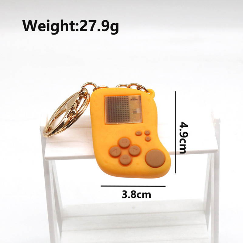 Creative Simulation Question M - огляд і ціна Gaming Console Keychain