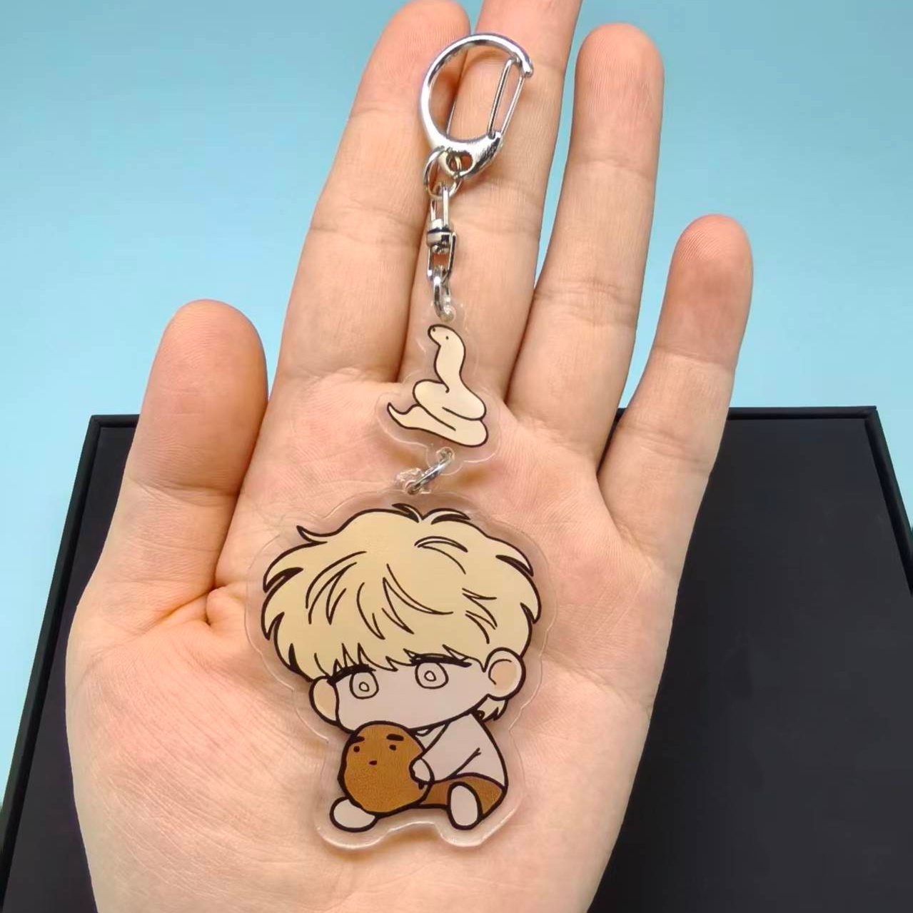 The Sacred Serpent's Seduction - огляд і ціна Gaming Console Keychain